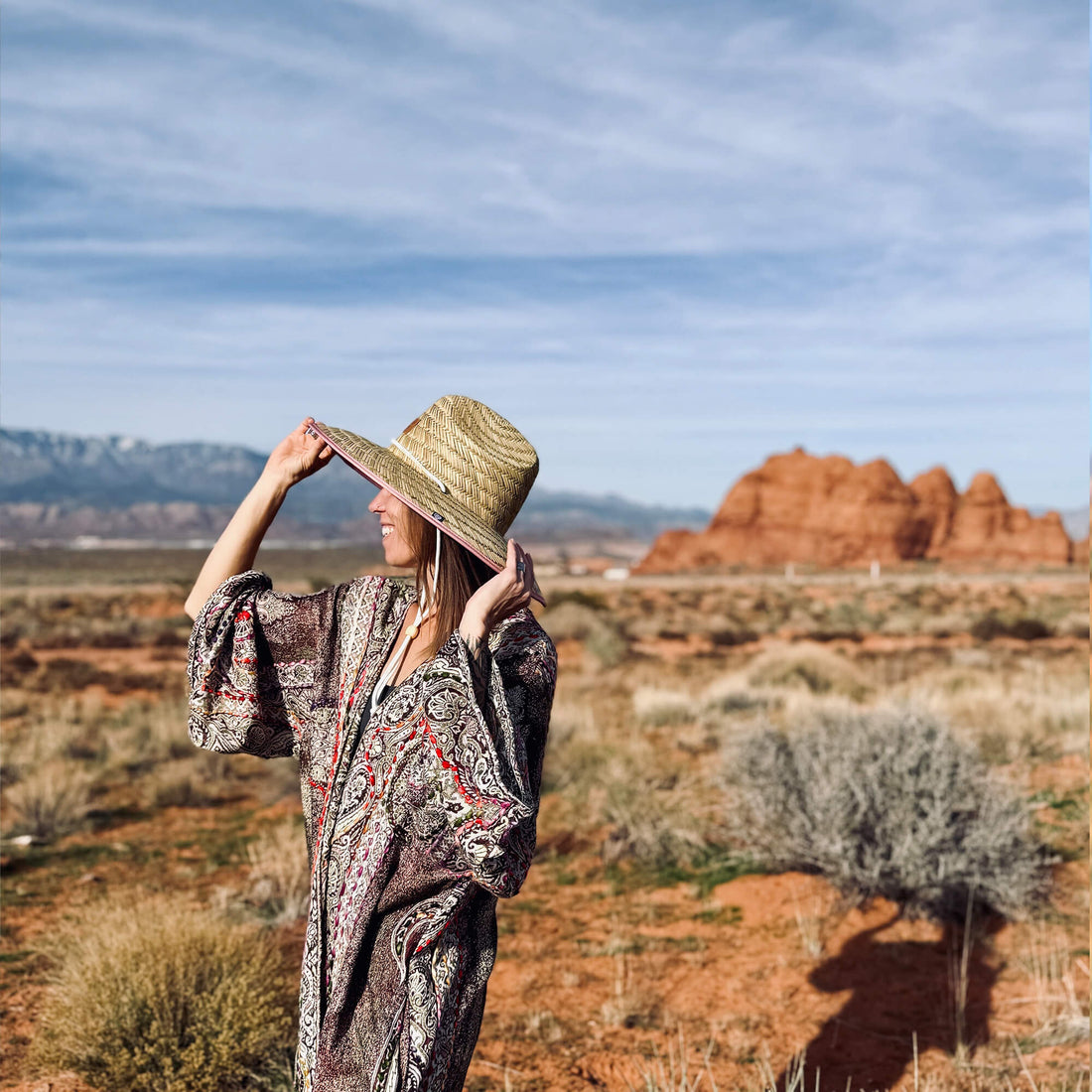 Charlee Girl rayon viscose clothing and natural straw sun hat thoughtfully styled in warm natural light