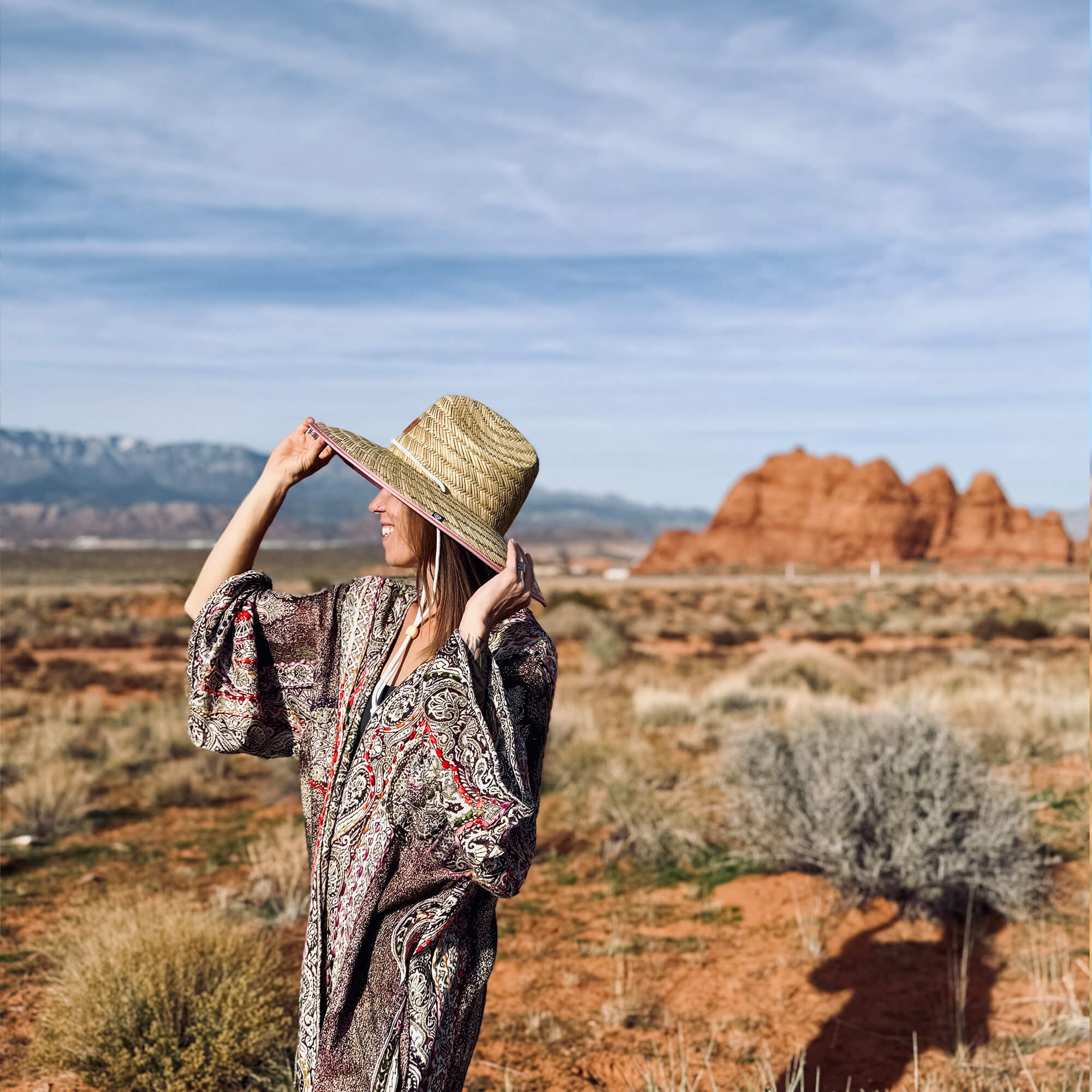 Charlee Girl rayon viscose clothing and natural straw sun hat thoughtfully styled in warm natural light