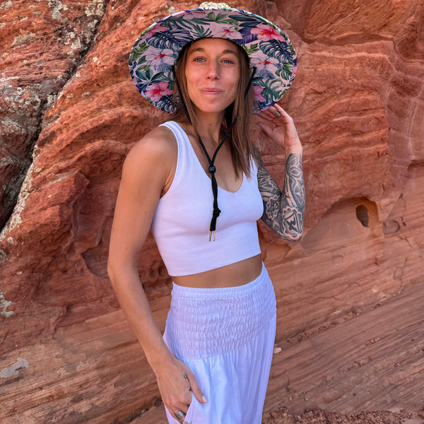 Side view of The Tenley Rush & Mat hat with moonlight harem pants — structured tropical hibiscus sun hat