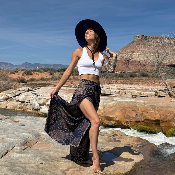 Karlene in JoJo Hollow Mat hat with Wild Bloom palazzo pants — open weave sun hat boho look