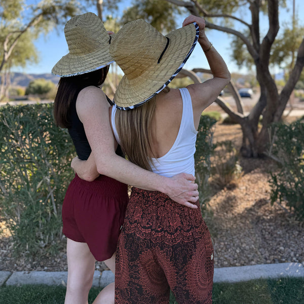 Group shot of Sierra Fire mandala harem pants and Ruby Garnet shorts — red mandala boho pants