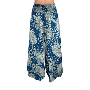 Side slit detail on Wild Bloom Azure Sky palazzo pants — blue wide leg pants