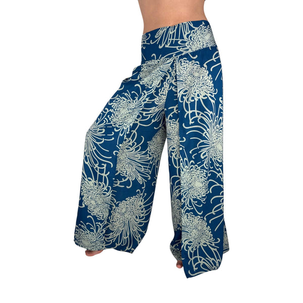 Woman wearing blue floral palazzo pants — boho wide leg pants