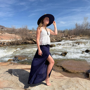 Tenley wearing JoJo Hollow Mat sun hat with palazzo pants — ocean blue straw hat styled