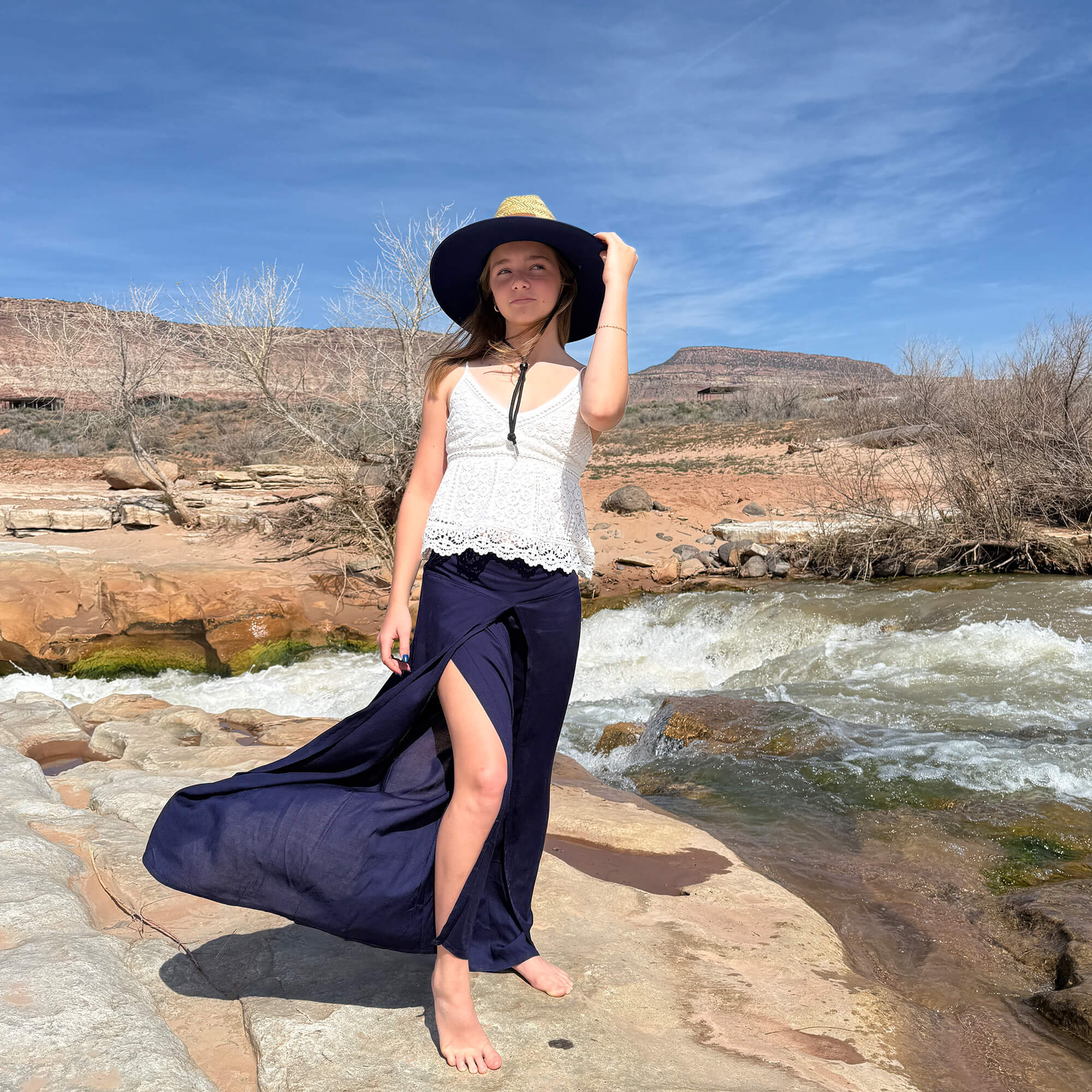 Ocean Wave palazzo pants styled with JoJo Hollow Mat hat — navy boho palazzo pants