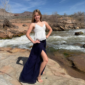 Woman wearing navy Ocean Wave palazzo pants — flowy wide leg rayon pants