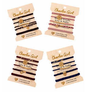 All four Charlee Girl element bracelet stacks together — boho hair tie bracelet set collection