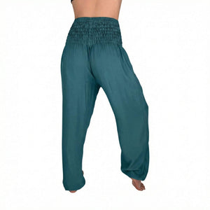 Woman wearing teal harem pants — turquoise boho pants