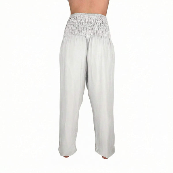 Deep hip pockets with heart logo on Moonlight White harem pants — harem pants with pockets