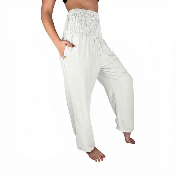 Woman wearing white harem pants — white flowy pants
