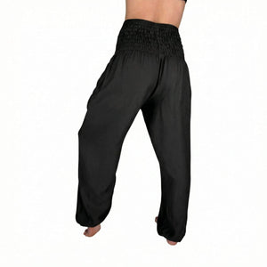 Woman wearing black harem pants — black boho pants