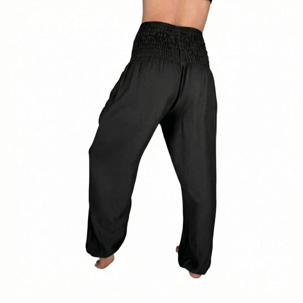 Woman wearing black harem pants — black boho pants