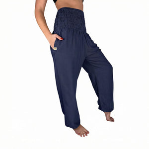 Side drape view of Ocean Wave harem pants — navy boho pants styled