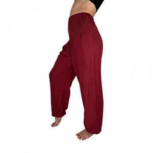 Woman wearing red harem pants — burgundy boho pants