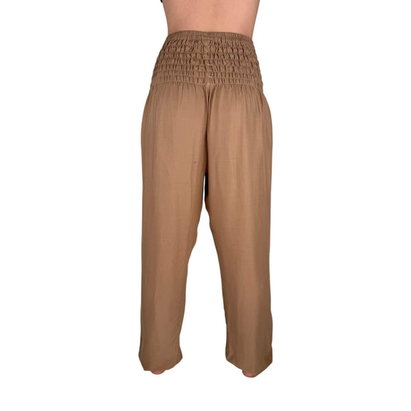 Deep hip pockets with heart logo on Sandstone harem pants — harem pants with pockets