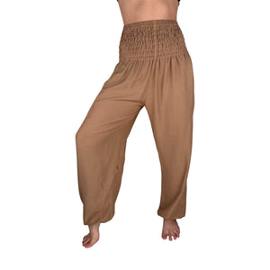 Side drape view of Sandstone harem pants — tan boho pants styled