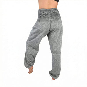 Side view of Grey Cloud wool sweatpants — grey wool harem pants