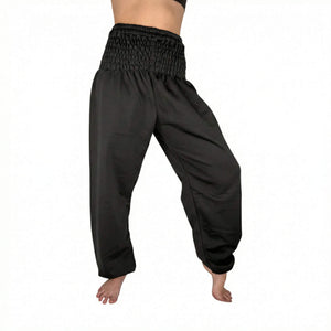 Soft wool fabric detail on Obsidian Black sweatpants — 100% wool texture close-up