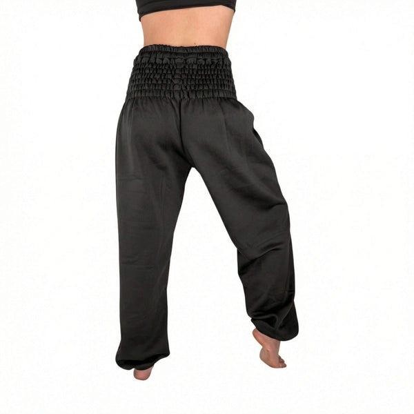 Woman wearing black wool harem sweatpants — cozy black wool joggers