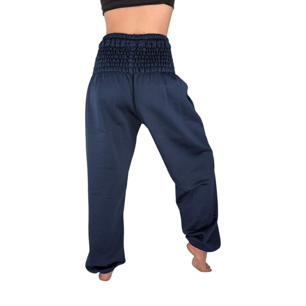 Soft wool fabric detail on Ocean Wave Blue sweatpants — 100% wool texture close-up