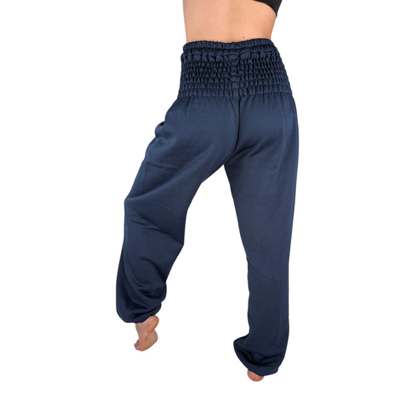 Woman wearing blue wool harem sweatpants — navy wool joggers