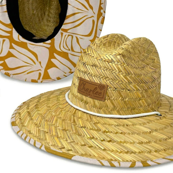 The Charlee Hollow Mat hat tropical leaf design close-up — women's beach hat