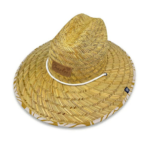The Charlee Hollow Mat sun hat styled on model — tropical leaf wide brim hat
