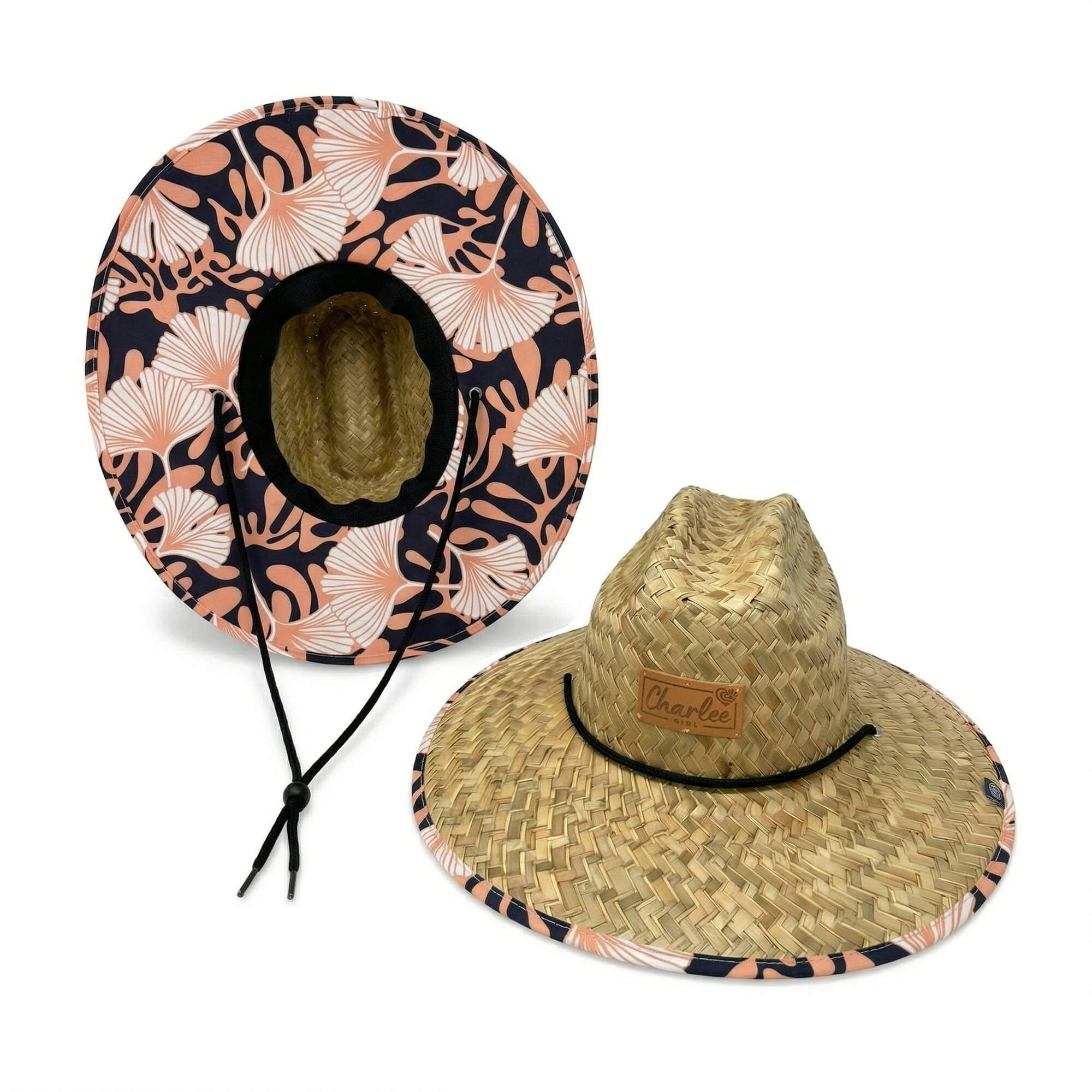 Woman wearing The Anna straw sun hat — navy fan floral wide brim hat