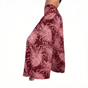 Side slit detail on Wild Bloom Dusty Ruby palazzo pants — red wide leg pants