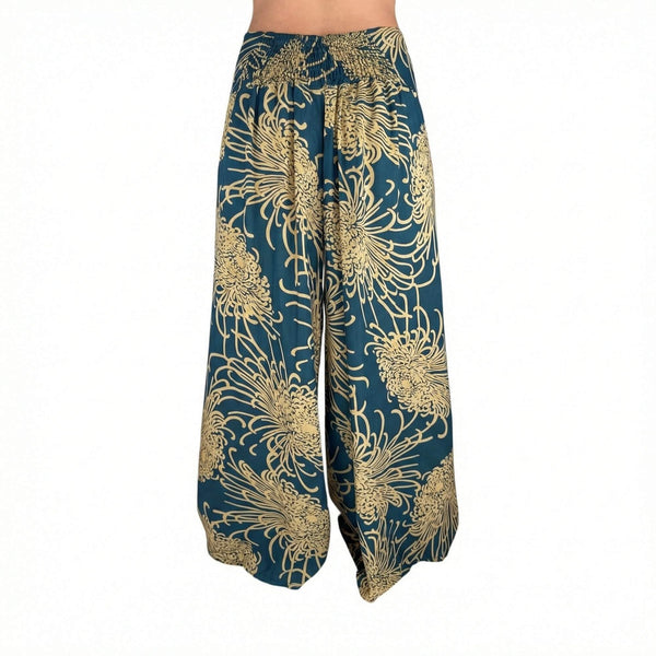 Side slit detail on Wild Bloom Rooted Earth palazzo pants — brown wide leg pants