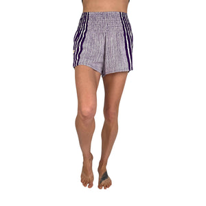 Woman wearing amethyst purple printed shorts — boho printed shorts outfit