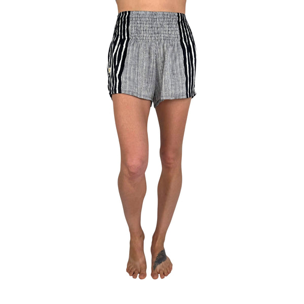 Woman wearing obsidian black printed shorts — boho printed shorts outfit