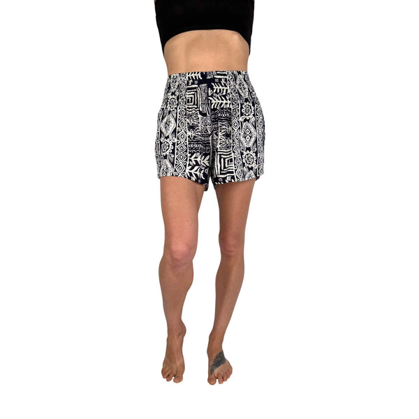 Woman wearing ocean wave navy printed shorts — boho printed shorts outfit