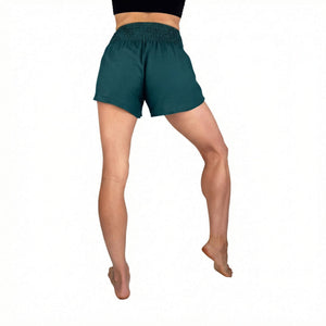 Smocked waistband on Lagoon shorts — teal smocked waist shorts