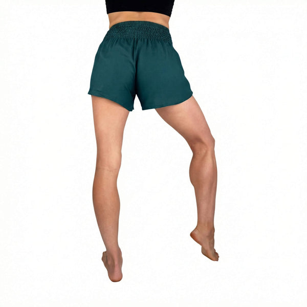Smocked waistband on Lagoon shorts — teal smocked waist shorts