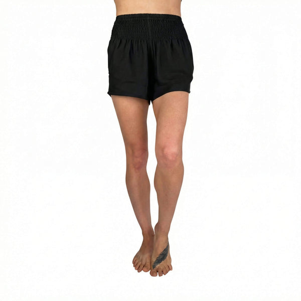 Woman wearing black boho shorts — casual black shorts outfit