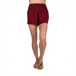 Woman wearing red boho shorts — casual red shorts outfit