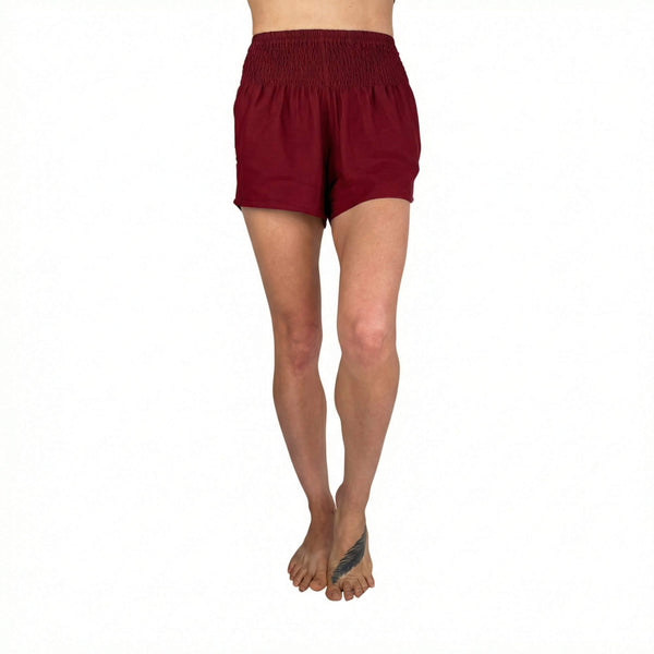 Woman wearing red boho shorts — casual red shorts outfit